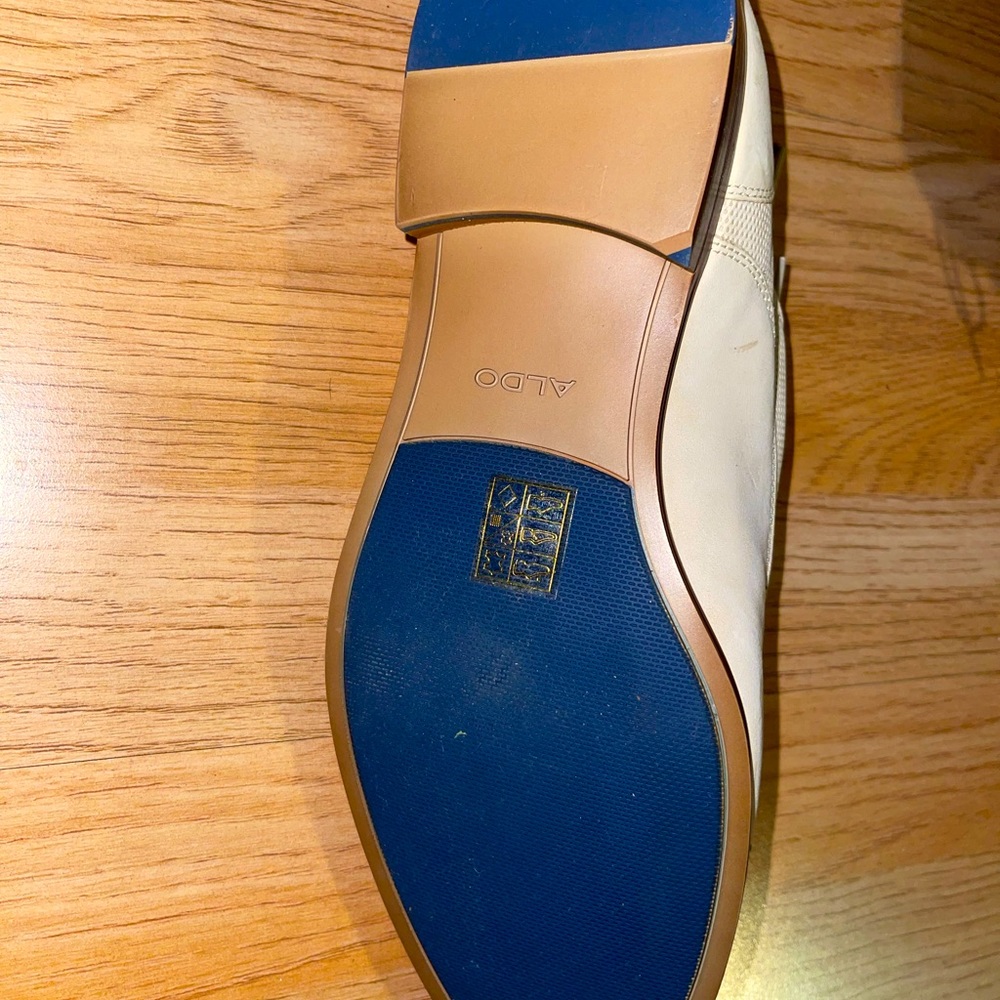 Aldo- Authentic(small Stain front face of shoe, glue mark on right ride)